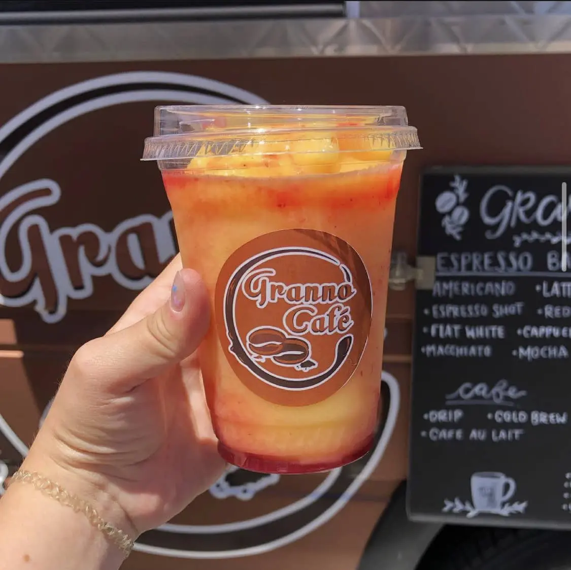 Mango blended drink with mango pieces on top